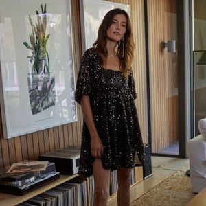 Love this sequel black, gold, and silver dress!  Only wore it once!!